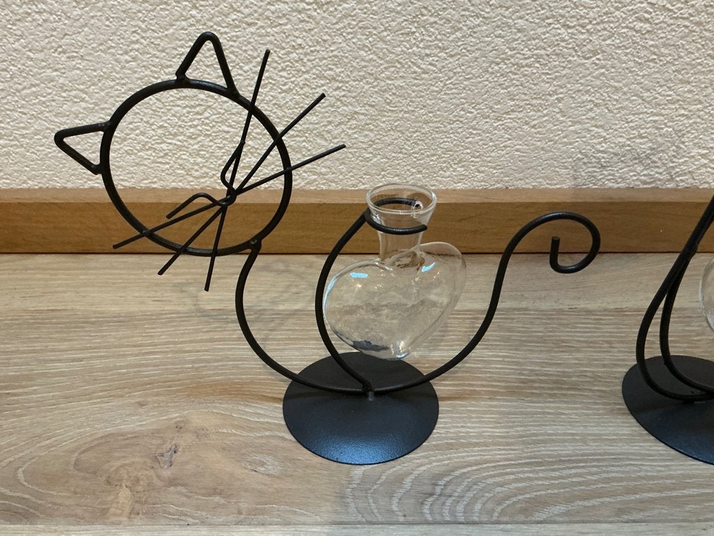 Te koop aangeboden 2 metalen katten met glazen hart., Ophalen of Verzenden, Zo goed als nieuw, Zwart, Metaal