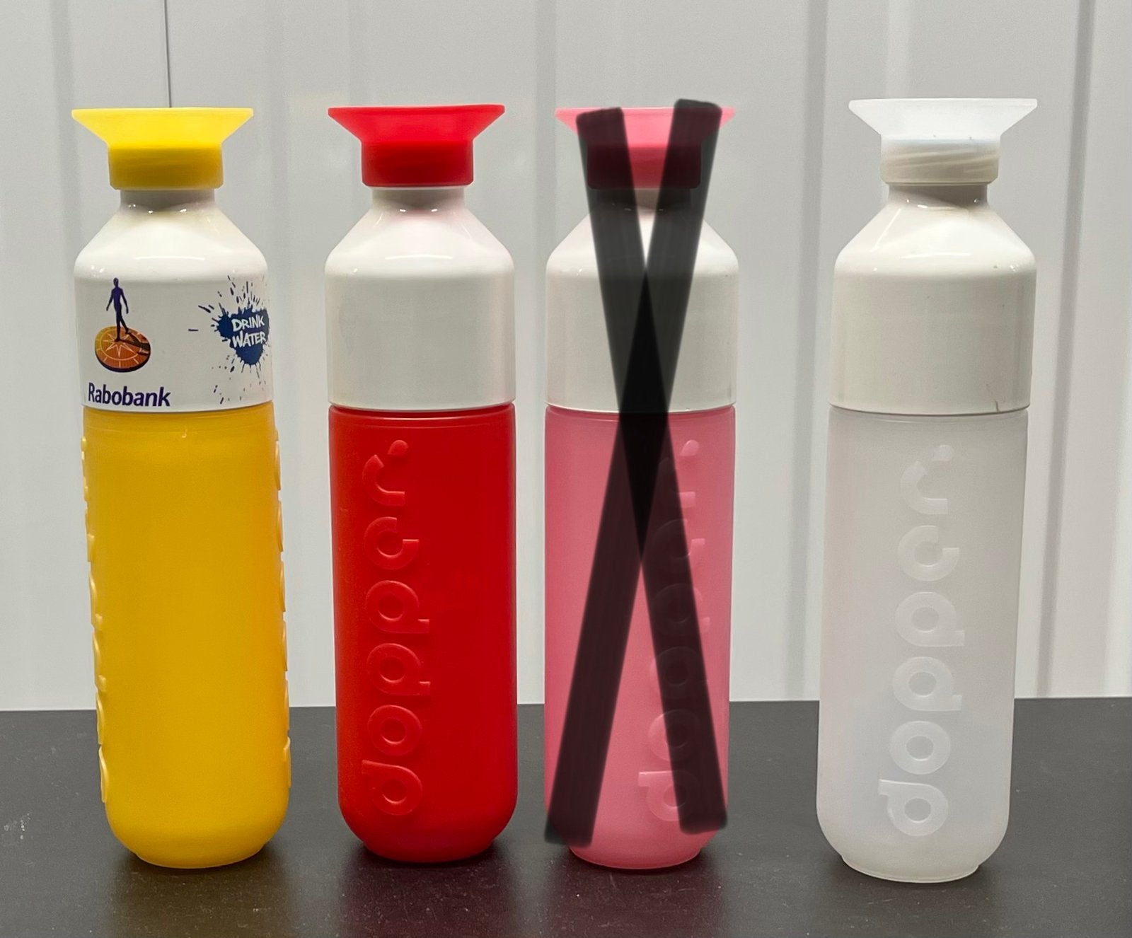 Dopper Waterflessen - de kleuren Geel, Rood en Transparant, Ophalen of Verzenden, Gebruikt