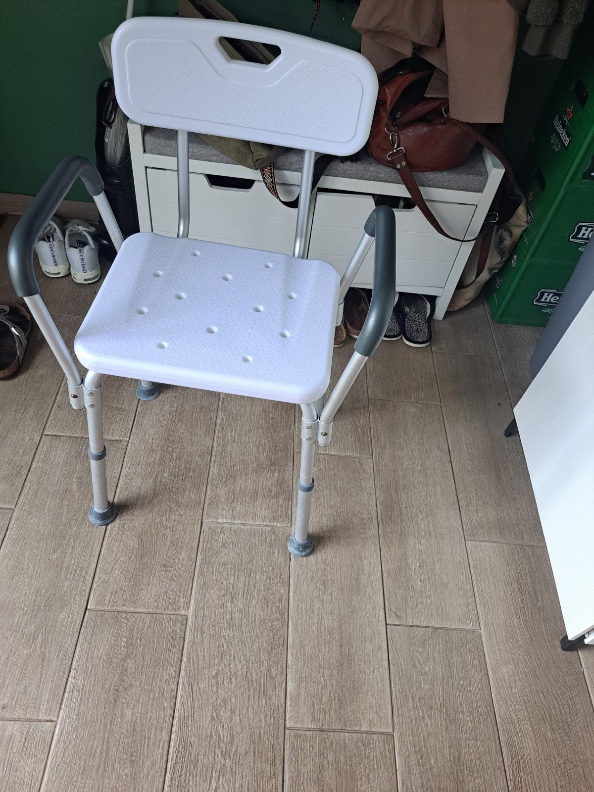 douchestoel, Ophalen