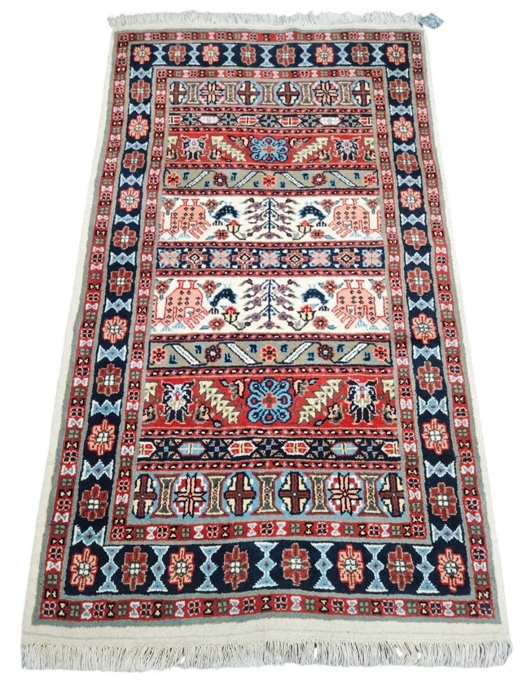 Handgeknoopt oosters wol vrolijk tapijt Tunesië 90x155cm