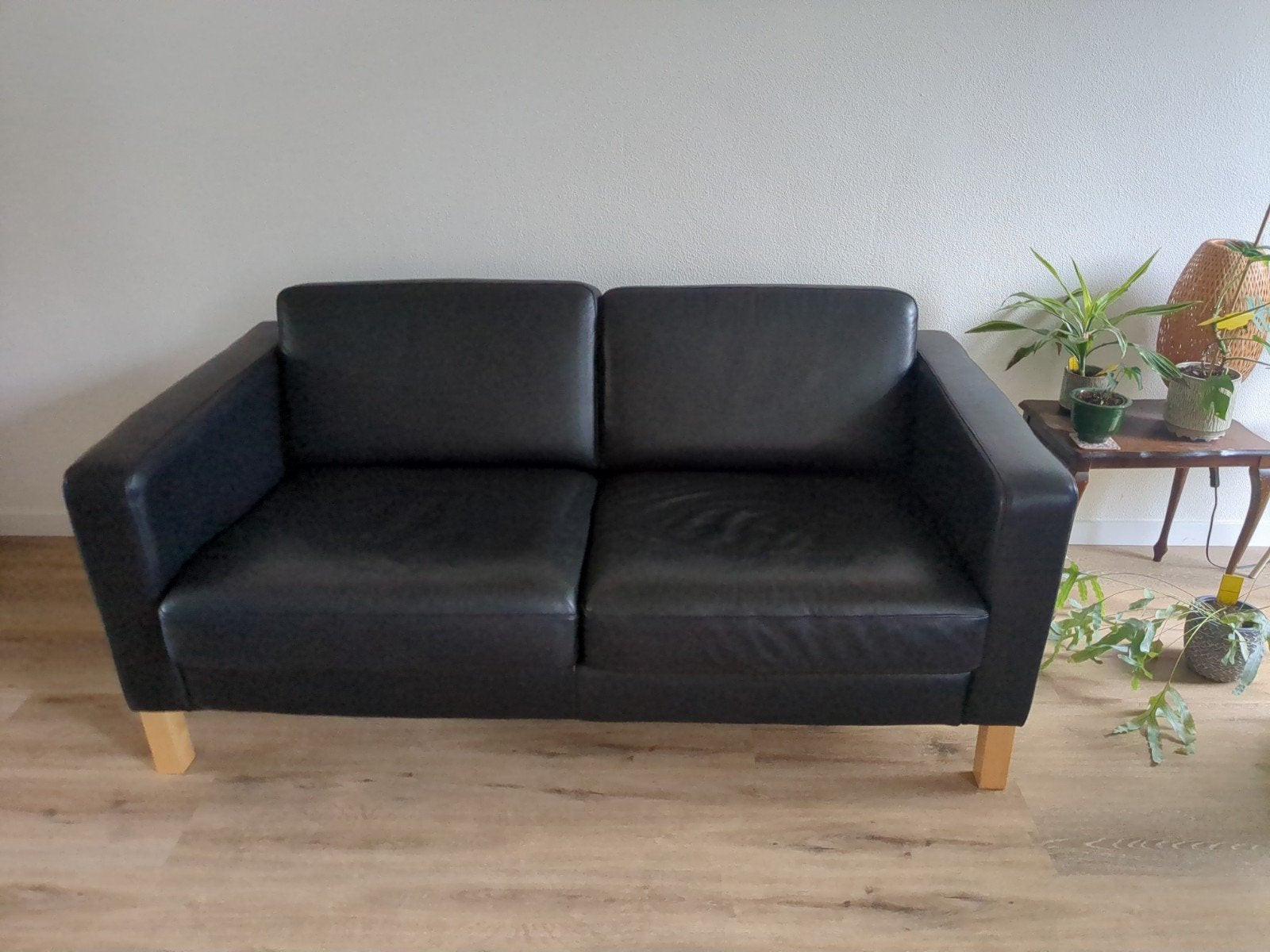 Zwarte leren tweezitsbank - Comfortabel en stijlvol, Ophalen, Gebruikt, 150 tot 200 cm, Tweepersoons