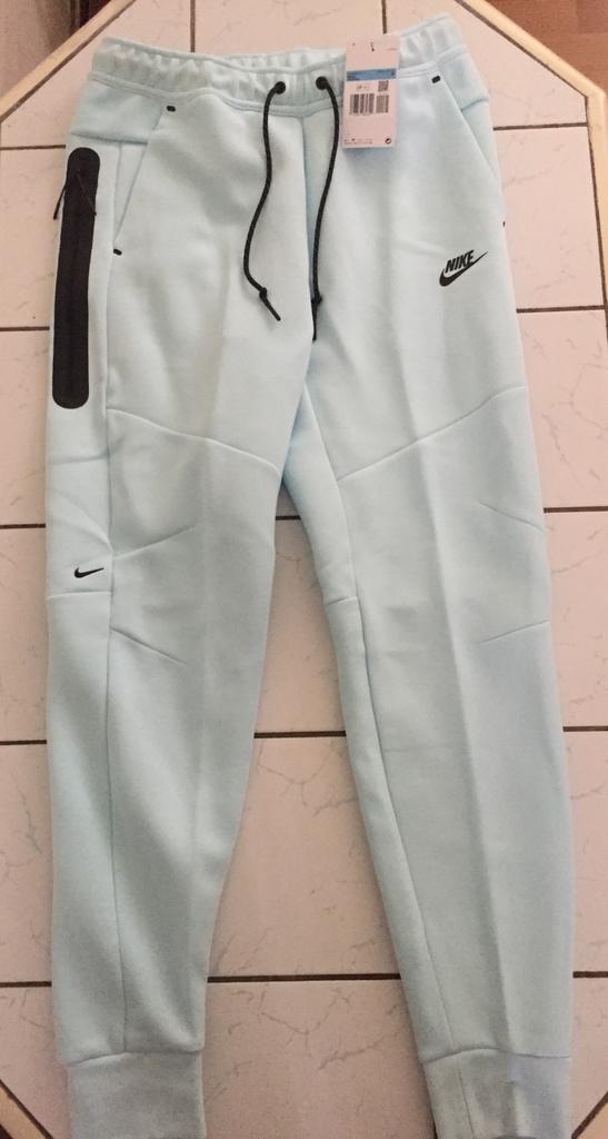 [NIEUW] Nike Tech Broek Glacier Blue, Ophalen, Nieuw, Maat 48/50 (M), Blauw