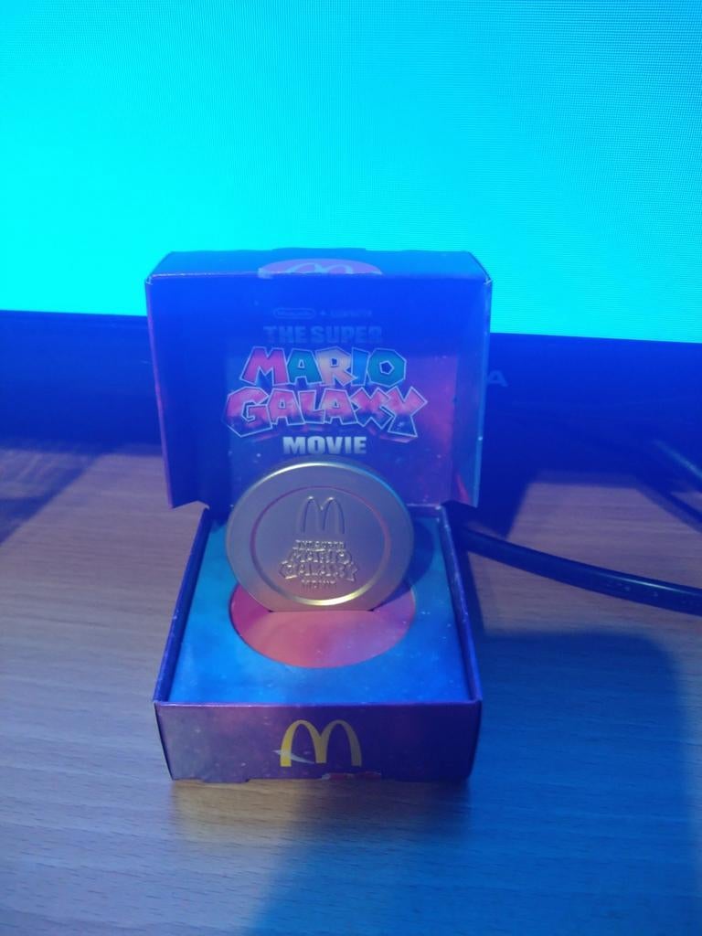 McDonald's Super Mario Galaxy Movie munt, Ophalen