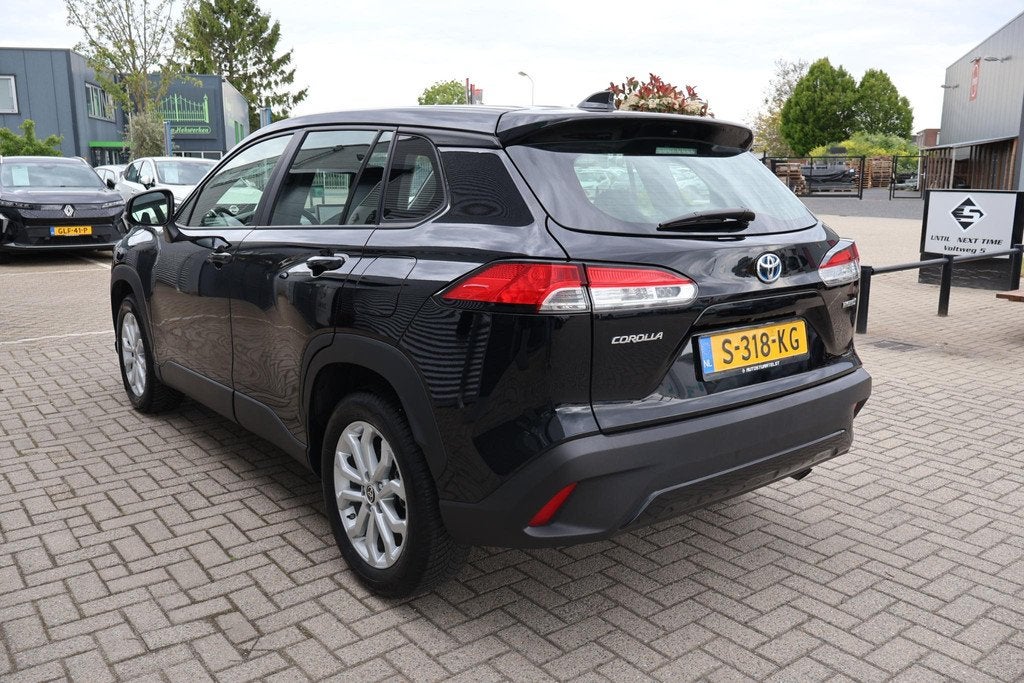 Toyota Corolla Cross 2.0 High Power Hybrid Active 1e Eigenaa, Auto's, Toyota, Stof, Gebruikt, 4 cilinders, Automatische klimaatregeling