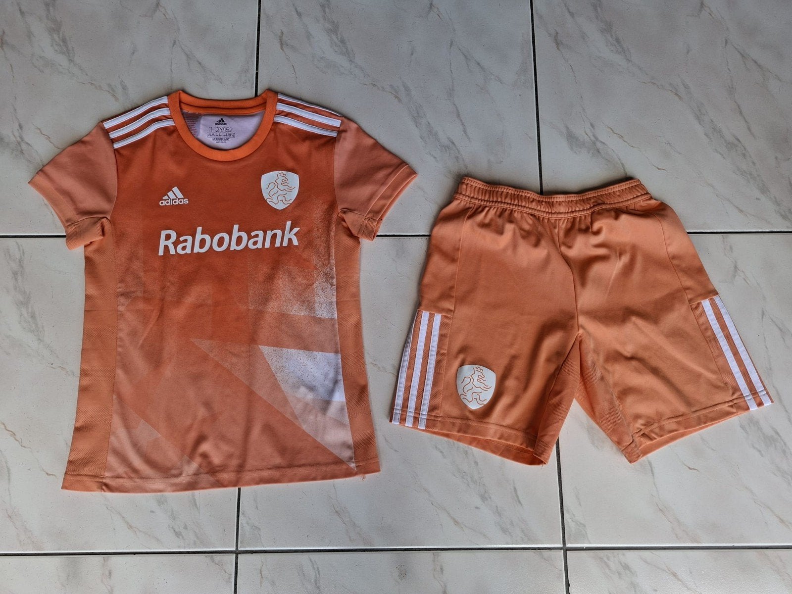 Nederlands elftal hockeytenue oranje maat 152 (11-12 jaar), Ophalen of Verzenden, Zo goed als nieuw, Kleding