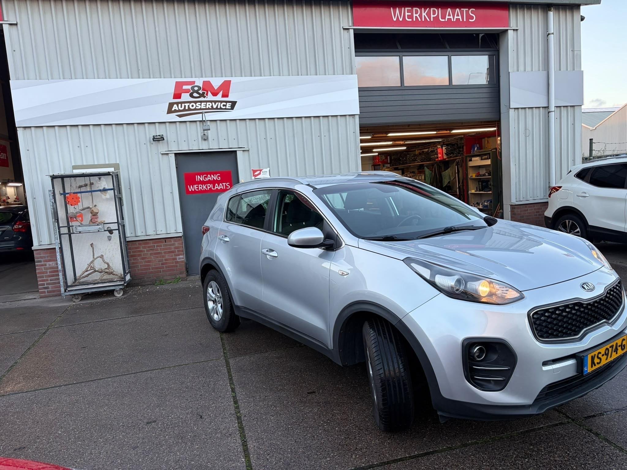 Kia Sportage 1.6 GDI ComfortLine Airco, cruise, camera, trek, Voorwielaandrijving, Stof, Gebruikt, 4 cilinders