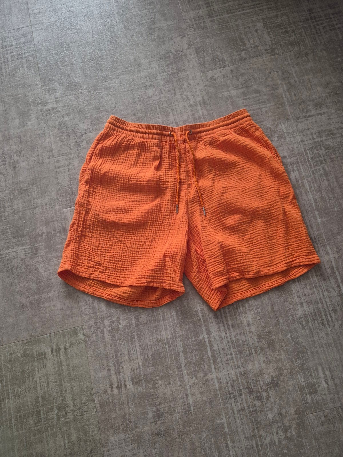 Oranje korte broek., Kort, Maat 42/44 (L), Nieuw, Oranje