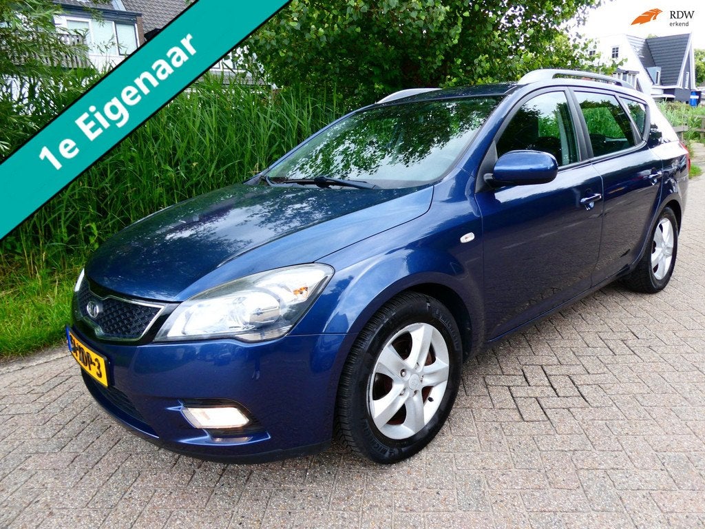 Kia Cee'd Sporty Wagon 1.4 CVVT Plus Pack Clima Cruise Navi, Voorwielaandrijving, Euro 5, Stof, 4 cilinders