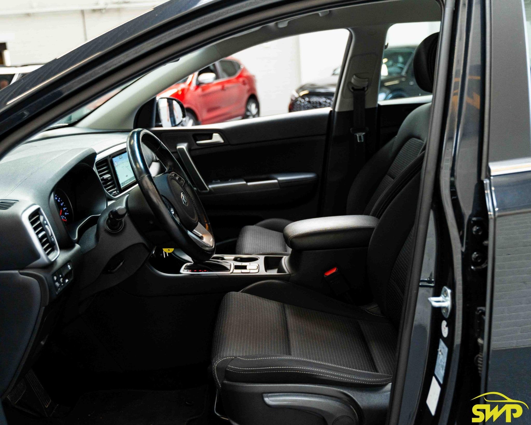 Kia Sportage 1.6 T-GDI 4WD DynamicLine | Navi | Trekhaak | C, Auto's, Stof, Gebruikt, Vierwielaandrijving, Parkeersensor