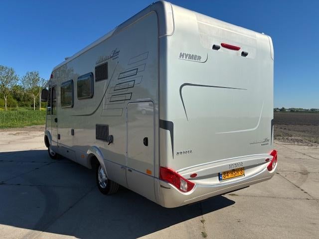 Hymer B614 CL, 2009 Orig NL geleverd, 2x Airco, 112414km NAP, Caravans en Kamperen, Campers, Integraal, Luifel, Ringverwarming