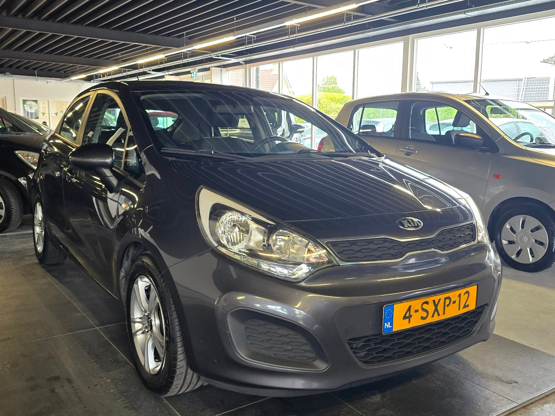 Kia Rio 1.2 CVVT Comfort Pack/AIRCO/5-DEURS/BOEKJES/, Auto's, Zwart, 4 cilinders, Origineel Nederlands, Bedrijf