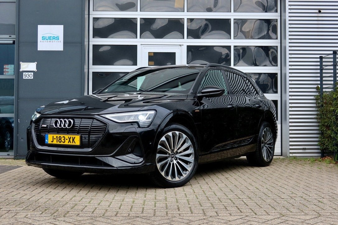 Audi E-tron 55 quattro S-Line | Pano | B&O | Memory | BTW |, Auto's, Automaat, 131 €/maand, Zwart, 95 kWh