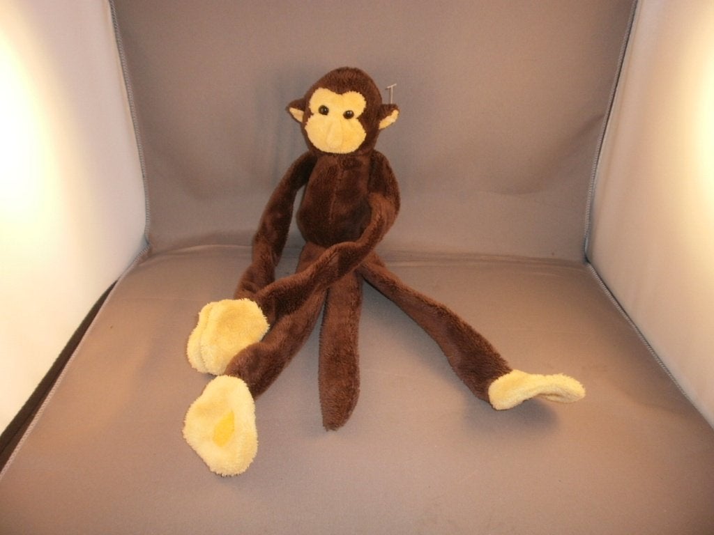 slinger aap donker bruin geel achtige masker poten/oren 40cm, Ophalen of Verzenden, Zo goed als nieuw, Middelgroot (20 tot 80 cm)