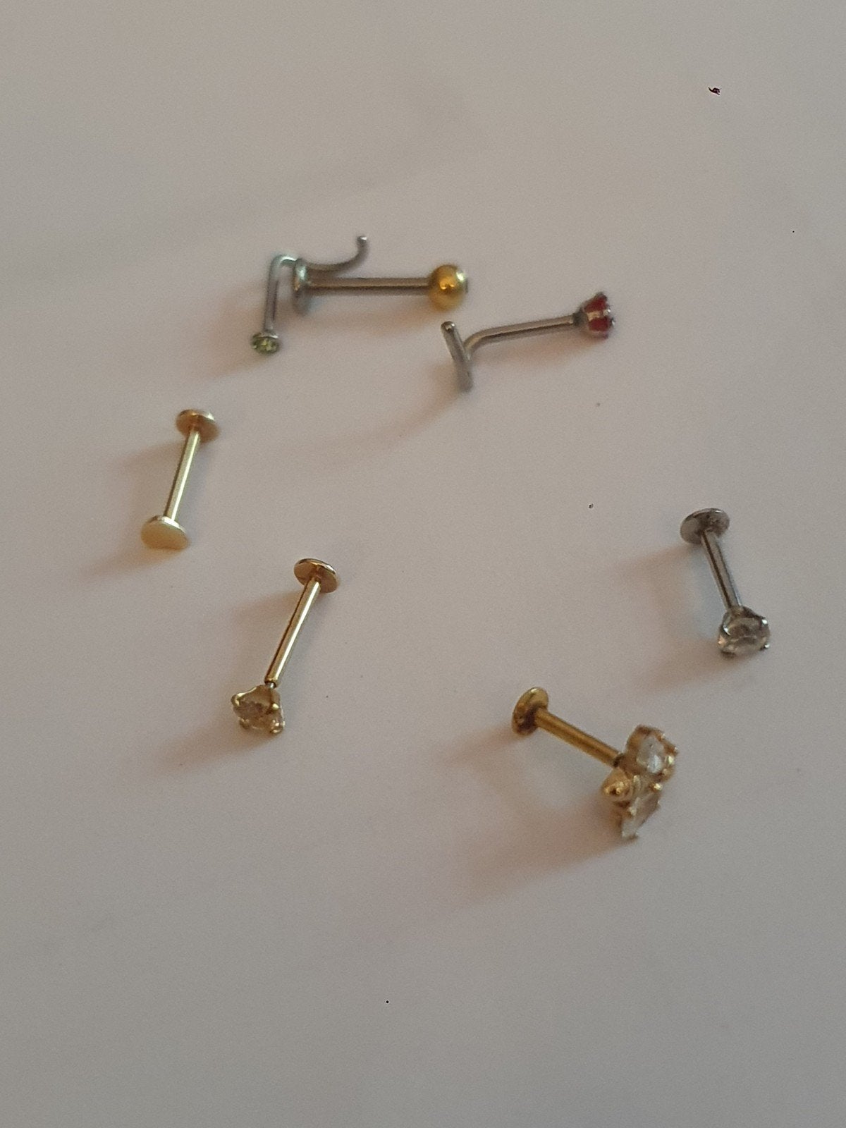 Verschillende neus piercings, Ophalen of Verzenden, Staal, Neuspiercing