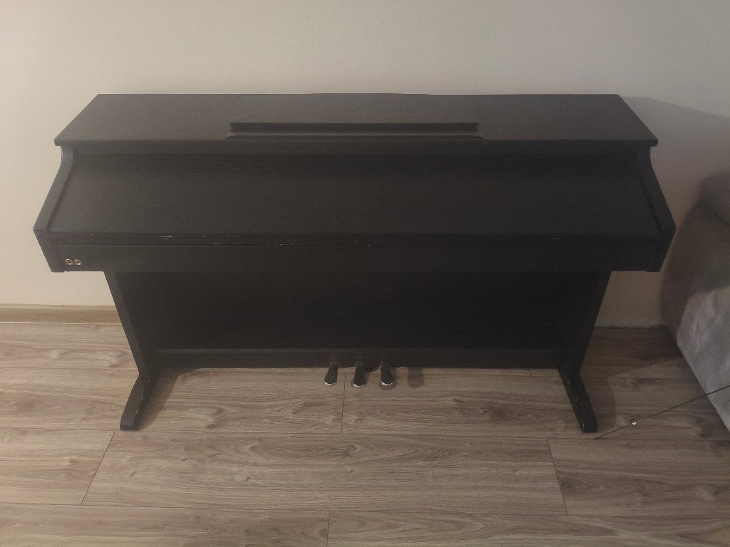 Foto 2 van Piano