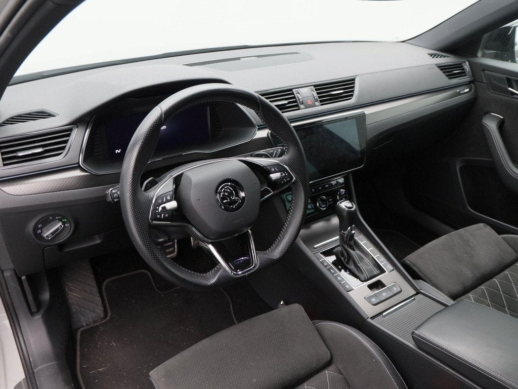 Skoda Superb Combi 1.4 TSi 218 Pk iV Sportline Business | Tr, Auto's, Skoda, Gebruikt, 4 cilinders, Alcantara, 1668 kg