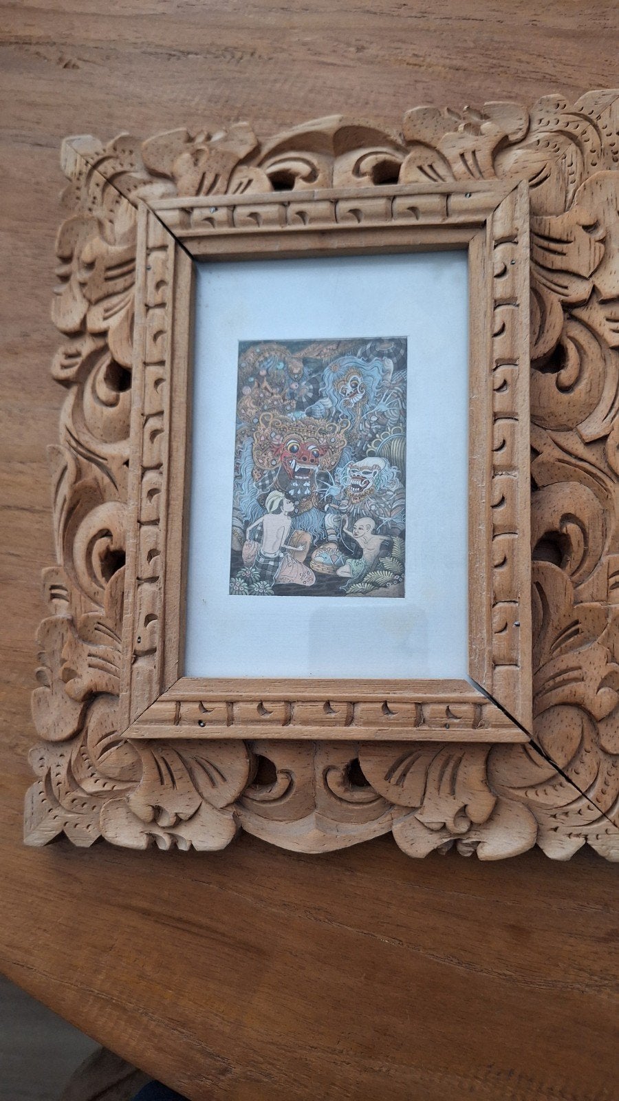 Set van 2 handgesneden houten fotolijsten met Balinese kunst, Huis en Inrichting, Bruin, Ophalen of Verzenden, Zo goed als nieuw