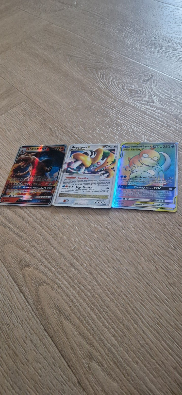 Pokémon Kaarten: Charizard, Regigigas, Dedenne GX, Ophalen of Verzenden, Zo goed als nieuw, Meerdere kaarten, Foil