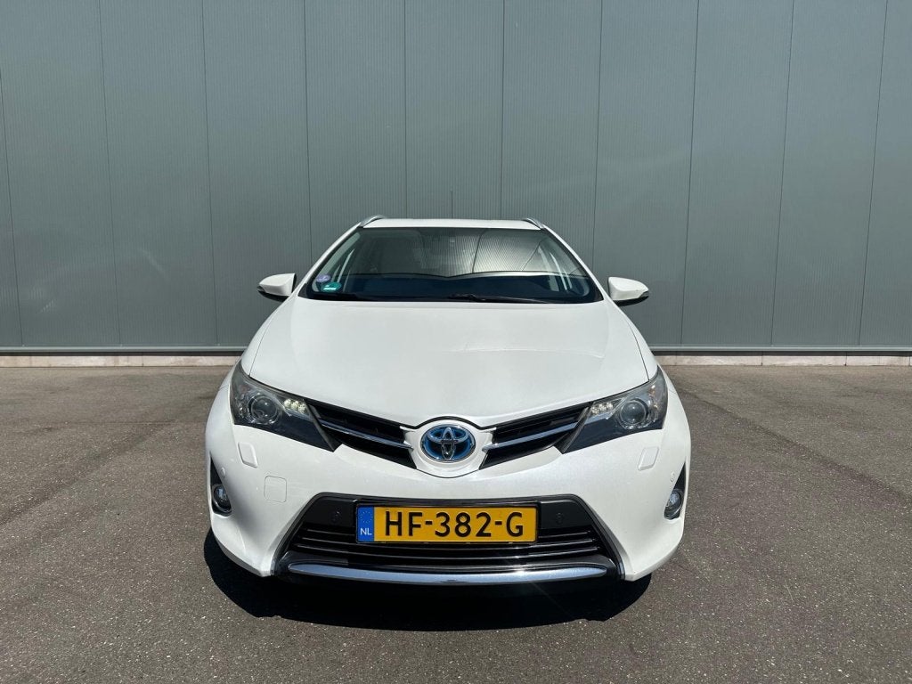 Toyota Auris Touring Sports 1.8 Hybr. Lease LEDER | CAMERA |, Auto's, Toyota, Automaat, Euro 5, 4 cilinders, Wit