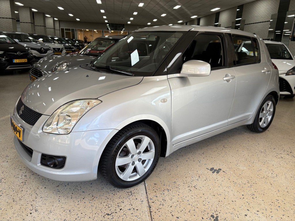 Suzuki SWIFT 1.3 COMFORT Airco CV Radio nieuwe apk, Voorwielaandrijving, Huisgarantie, Met garantie (alle), 400 kg