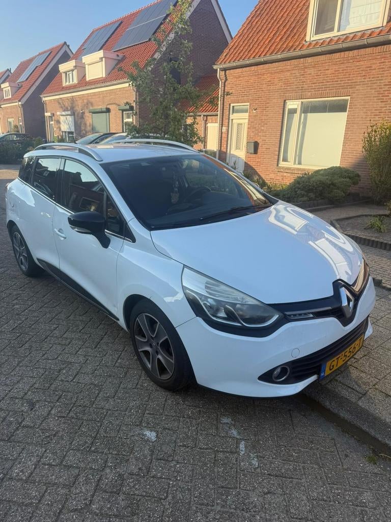 Renault Clio 1.5 DCI 66KW Estate 2015 Wit, Auto's, Voorwielaandrijving, Zwart, 4 cilinders, 1096 kg