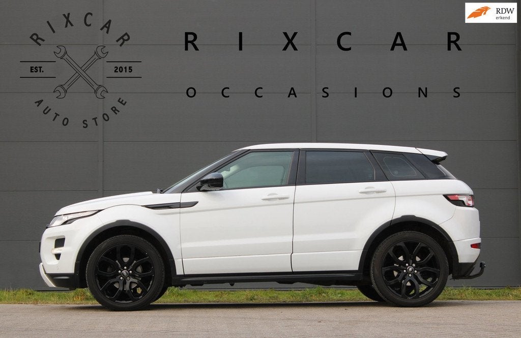Land Rover Range Rover Evoque 2.0 Si 4WD Prestige Meridian P, Auto's, Land Rover, Euro 5, Zwart, 4 cilinders, Wit