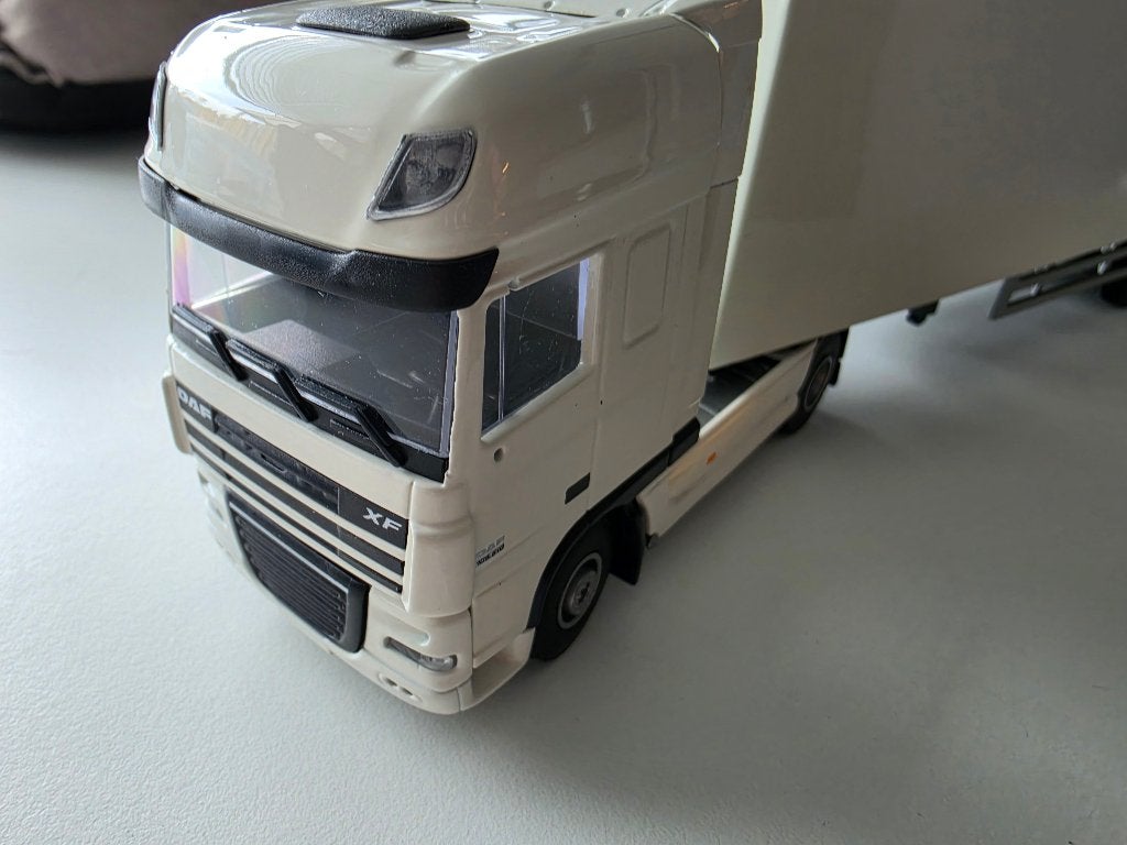 Daf XF met trailer Scandinavian Tobacco group 1/50, Ophalen of Verzenden, Nieuw, Bus of Vrachtwagen, Lion Toys