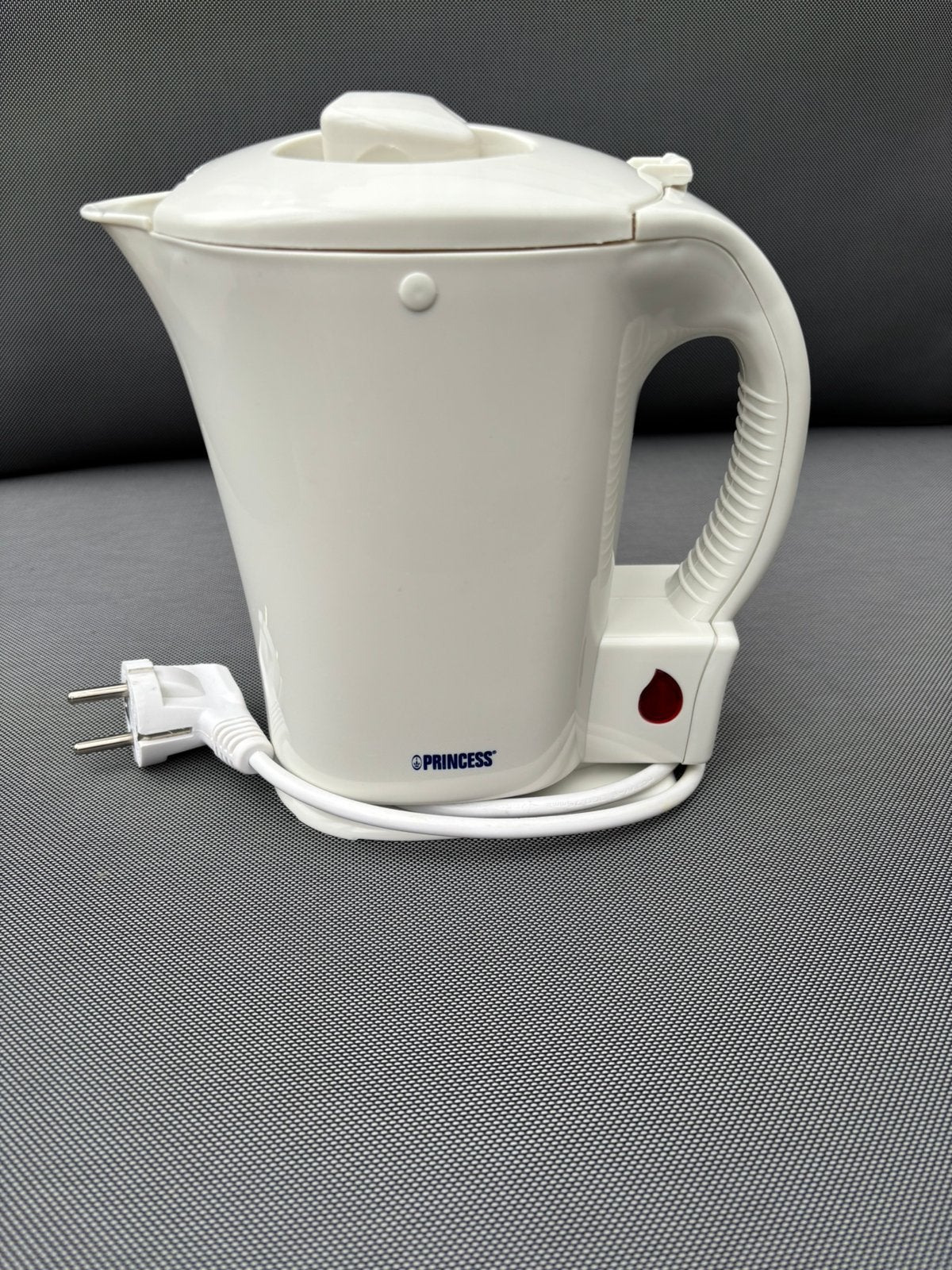 Lichtgewicht waterkoker, Ophalen, Gebruikt