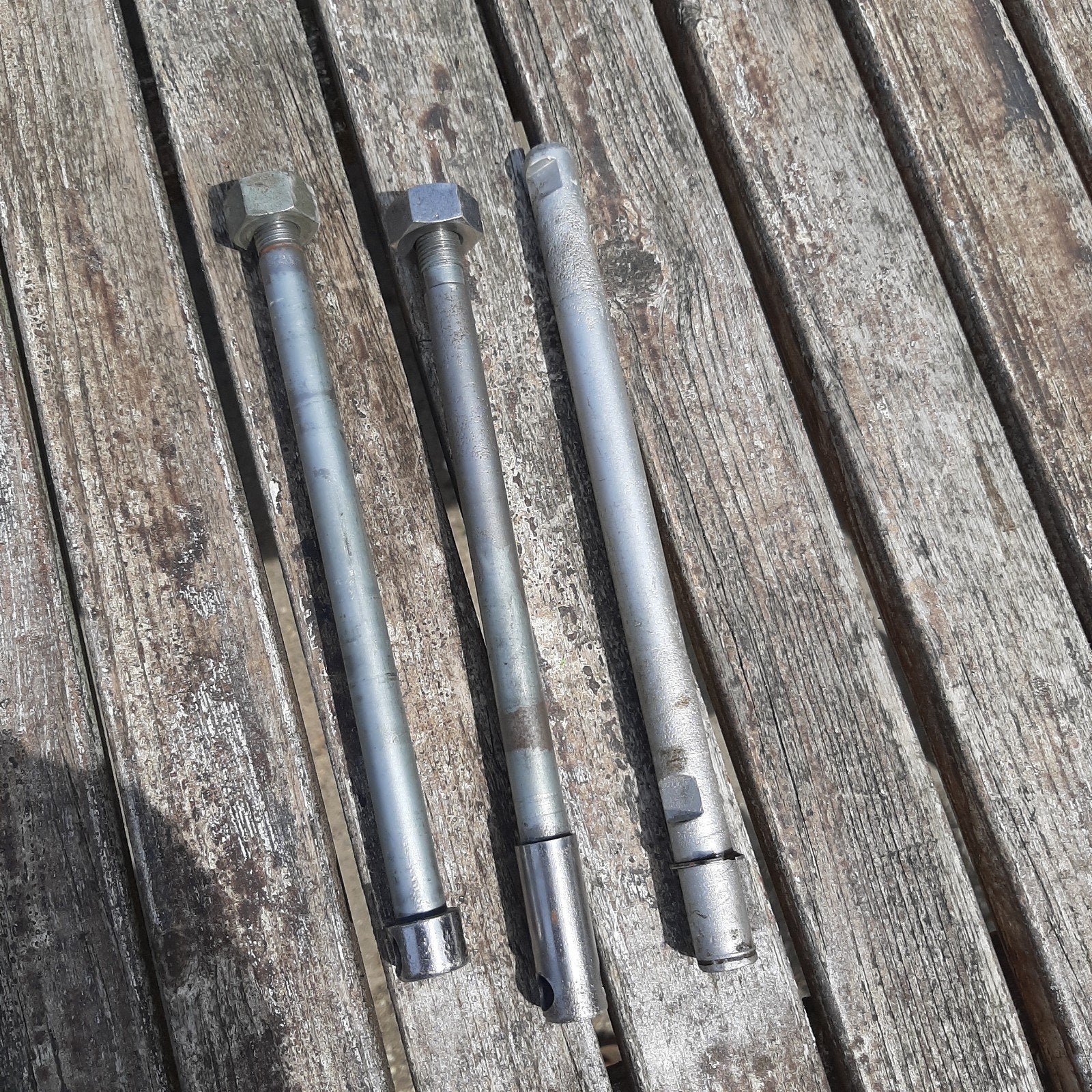 Set assen, voor en achterwielas, + achterbrug as, Ophalen of Verzenden, Gebruikt, Frame