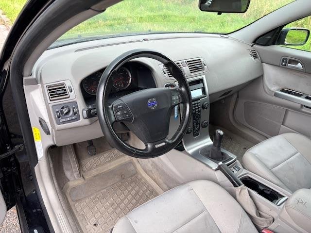 Volvo V50 2.4 Elan ECC Audio/CD Leder/stof LMV 18" Cruisecon, Auto's, Volvo, Gebruikt, 700 kg, Leder en Stof, Zwart
