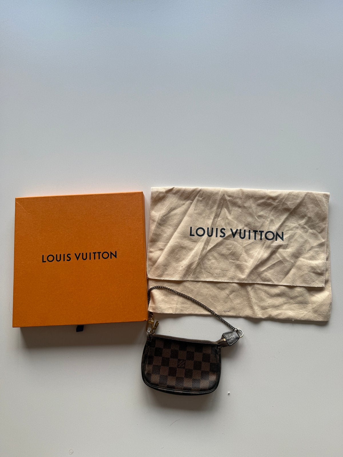 Louis Vuitton Mini Pochette, Ophalen of Verzenden, Zo goed als nieuw, Zwart