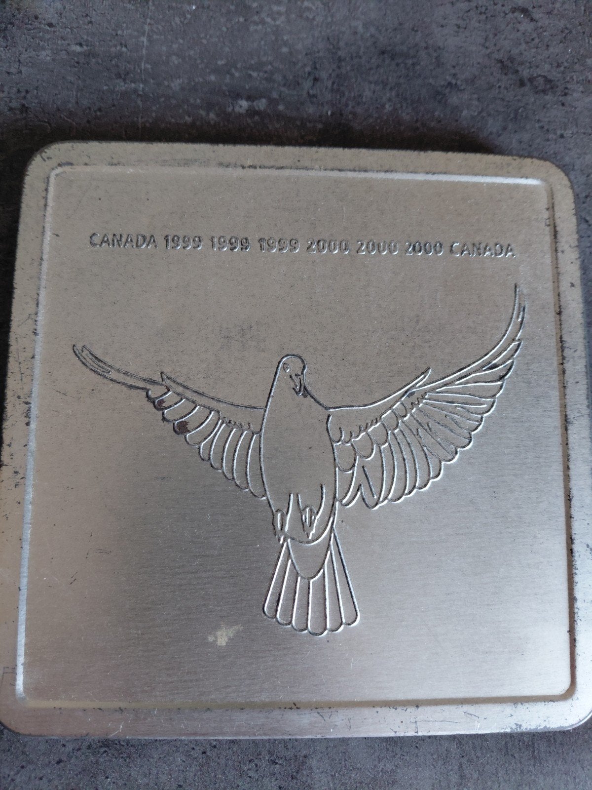 Canadese herdenkingsmunt 2000 met duif en 1999 hologram, Ophalen of Verzenden, Setje