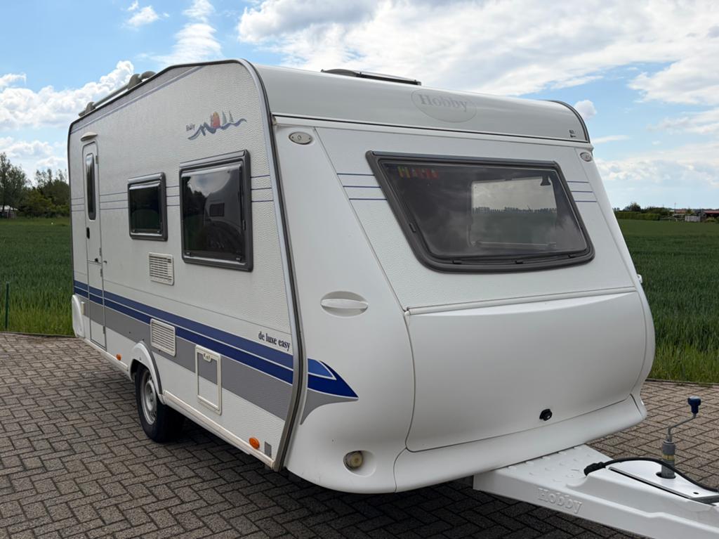 Hobby de luxe 440 SF 2006 VOORTENT/MOVER/FIETSENDRAGER/, Caravans en Kamperen, Caravans, Hobby, Bedrijf, Treinzit, Schokbreker