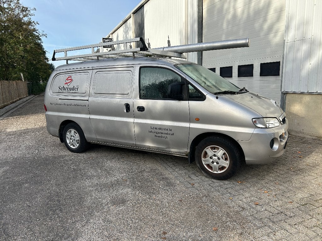 Hyundai H200 2.5 Crdi LWB 2006, Auto's, Zwart, Origineel Nederlands, Bedrijf, 1880 kg