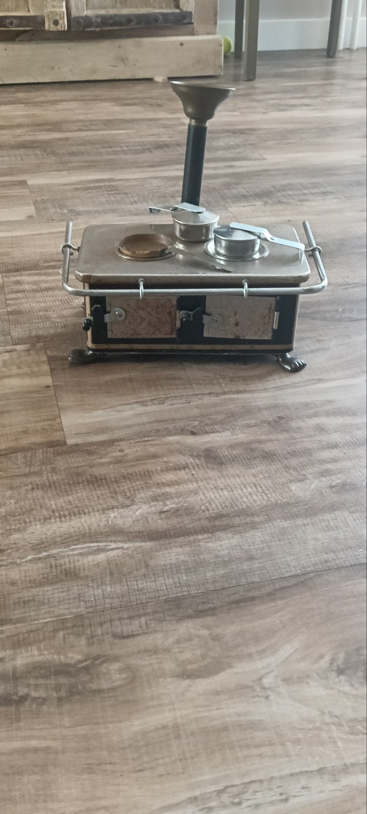 antiek mini fornuisje, Ophalen