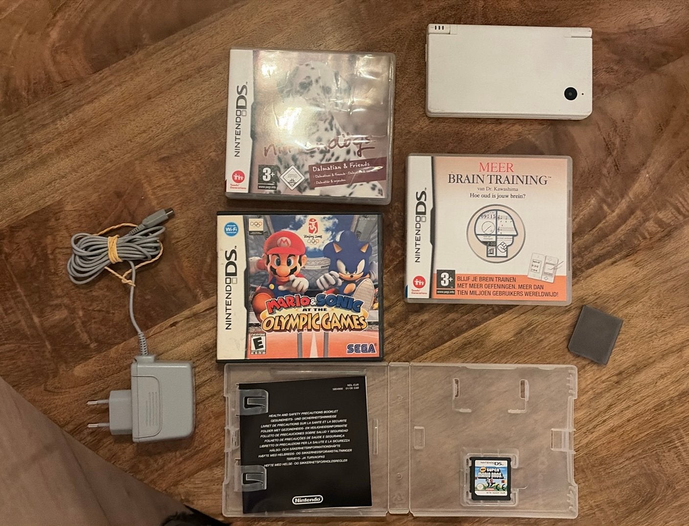 Nintendo dsi wit inc 4 games oa mario,s en oplader, Ophalen of Verzenden, Zo goed als nieuw, Wit, DS Lite