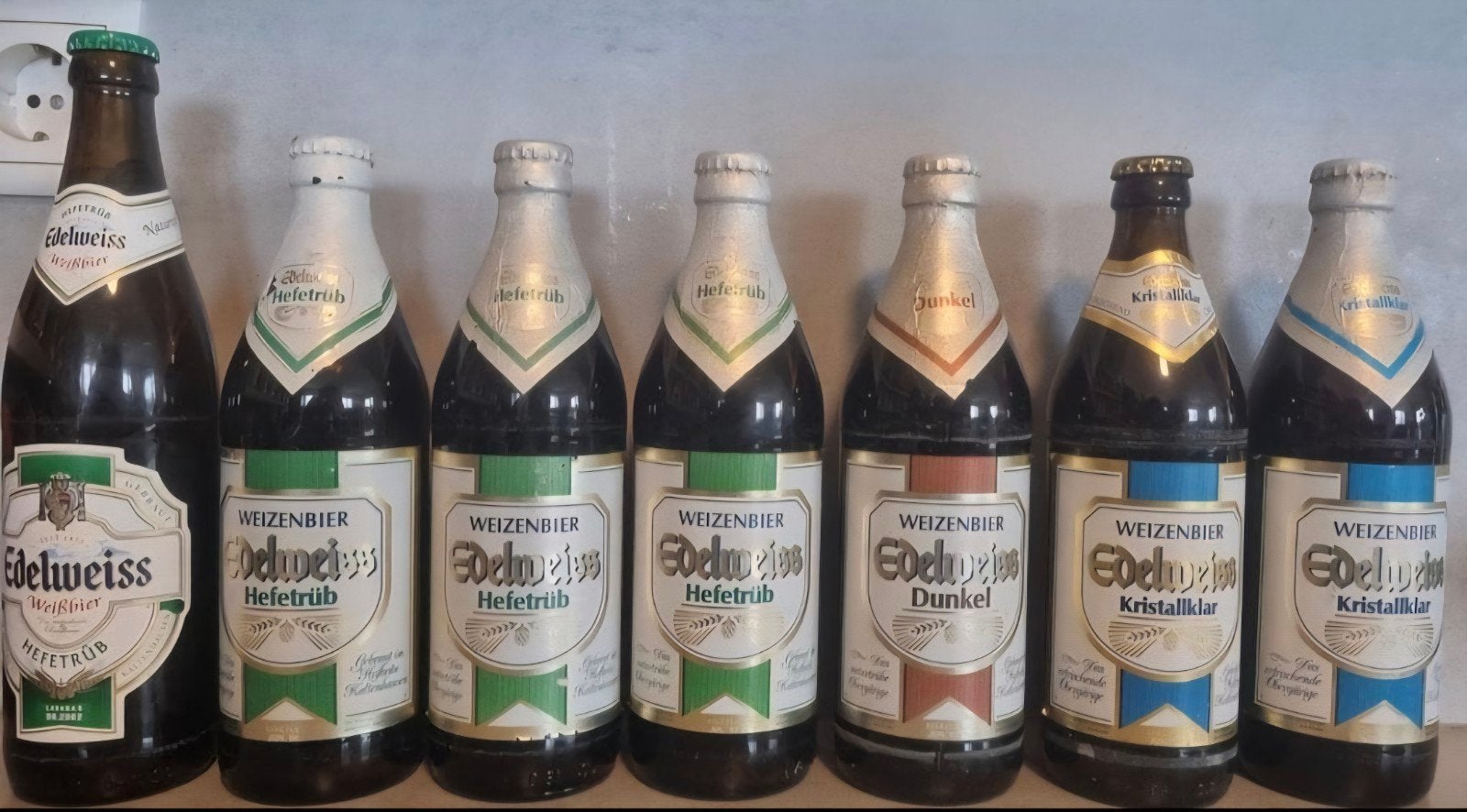 7x Edelweiss, Oostenrijk - Hofbräu Kaltenhausen - <'90-'02, Ophalen of Verzenden, Zo goed als nieuw, Flesje(s), Overige merken