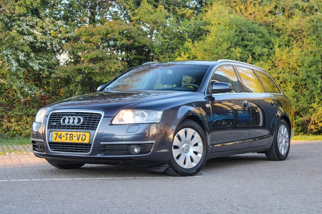 Audi A6 2.4 V6 177 pk Avant Quattro 2006 Grijs, Auto's, Audi, 1660 kg, Stof, Zwart, Origineel Nederlands