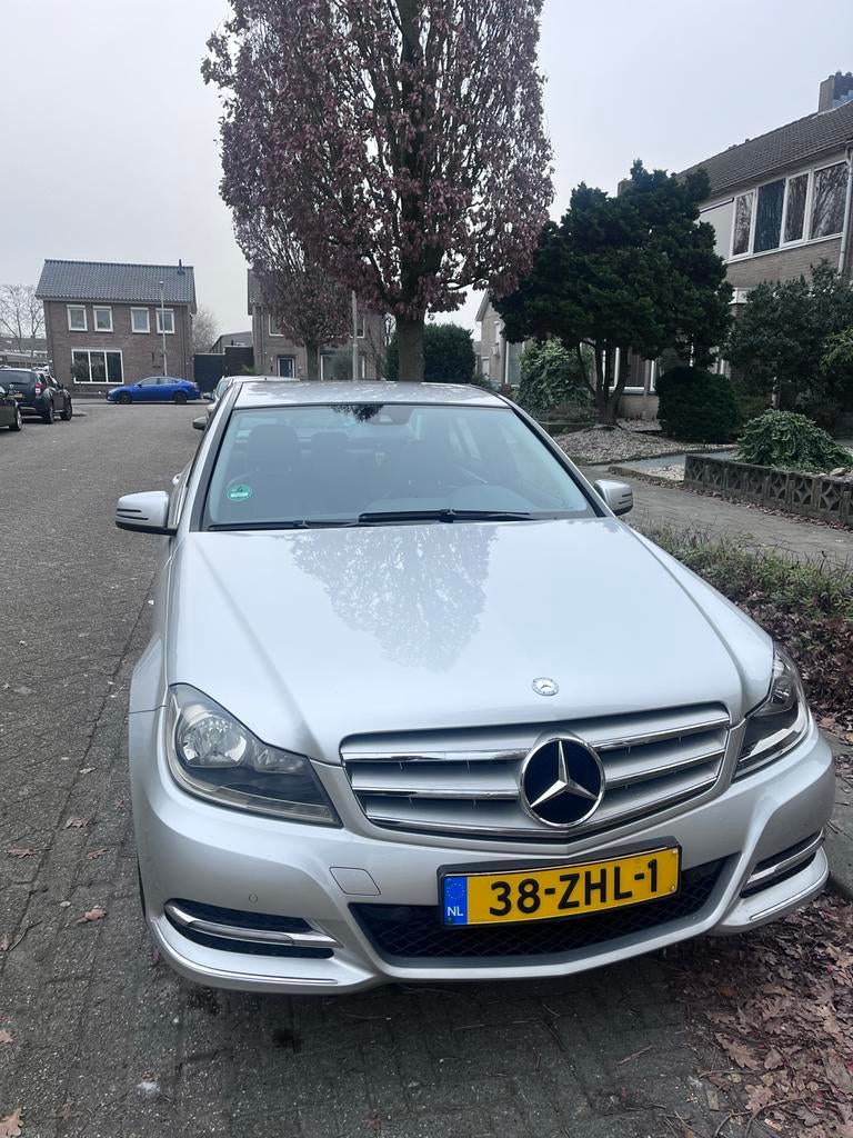Mercedes-Benz C-Klasse C180 BE Aut7 2012 Grijs, Automaat, 1800 kg, Origineel Nederlands, 75 €/maand