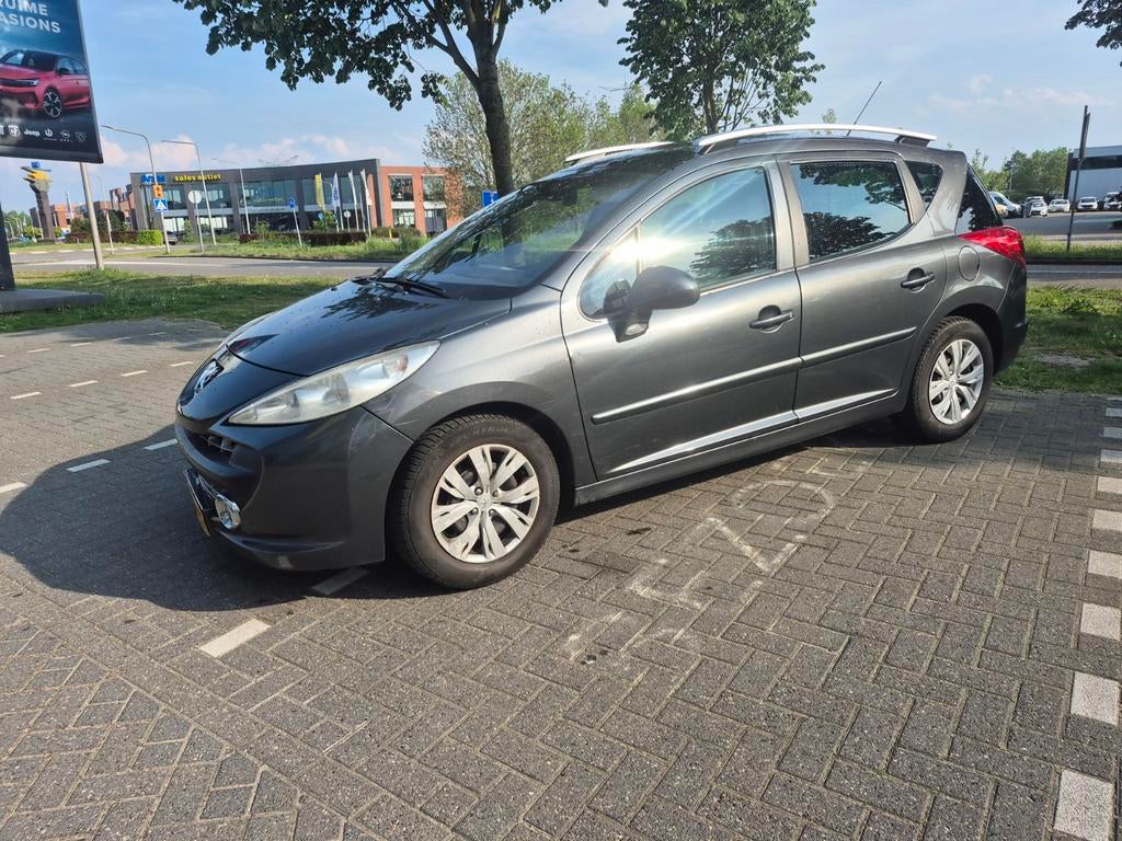 Peugeot 207 1.4 VTI 16V SW 2008 Grijs, Origineel Nederlands, Stationwagon, Handgeschakeld, 16 km/l