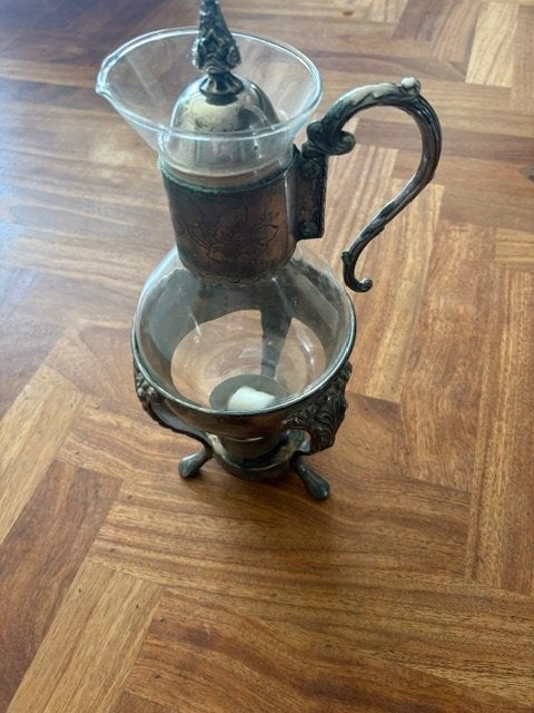 verzilverde koffiekan, Ophalen