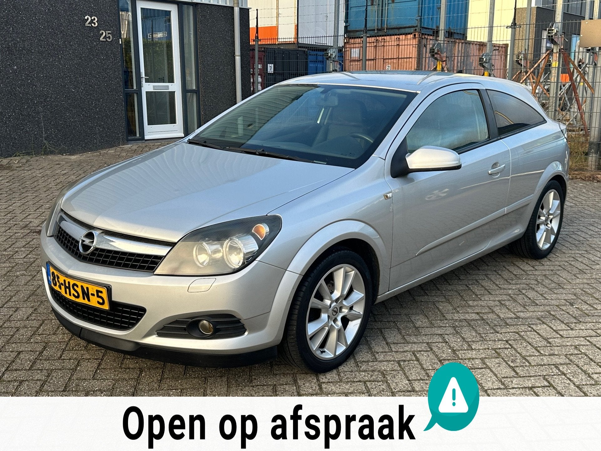 Opel Astra GTC 1.8 Business 2009 Leer Clima, Auto's, Voorwielaandrijving, Gebruikt, Zwart, 4 cilinders