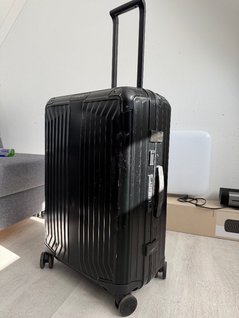 Samsonite Lite-Box Alu Spinner 69 cm Zwart – Nieuwprijs €800, Gebruikt, Hard kunststof, 45 tot 55 cm, Wieltjes