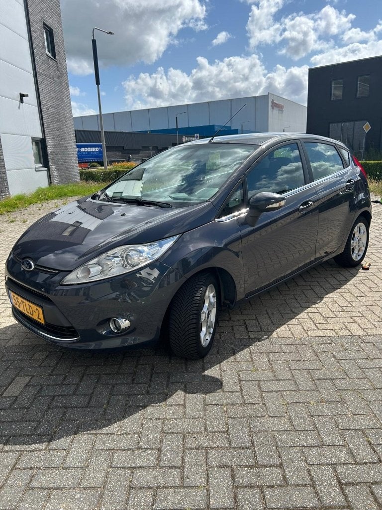 Ford Fiësta 1.25 60KW 5DR 2012 Grijs, Auto's, Ford, Particulier, Fiësta, ABS, Airbags, Airconditioning, Bluetooth, Boordcomputer