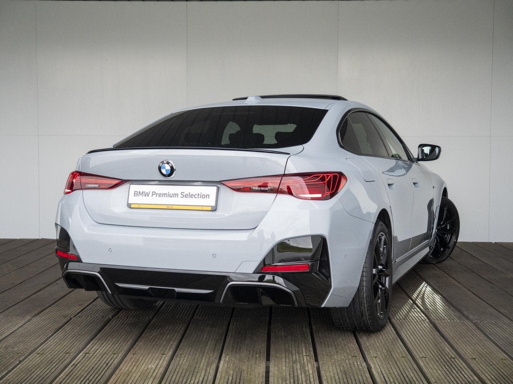 BMW i4 eDrive35 Gran Coupé | M Sportpakket | Comfort Pack |, Auto's, BMW, Gebruikt, Zwart, Met garantie (alle), 420 min