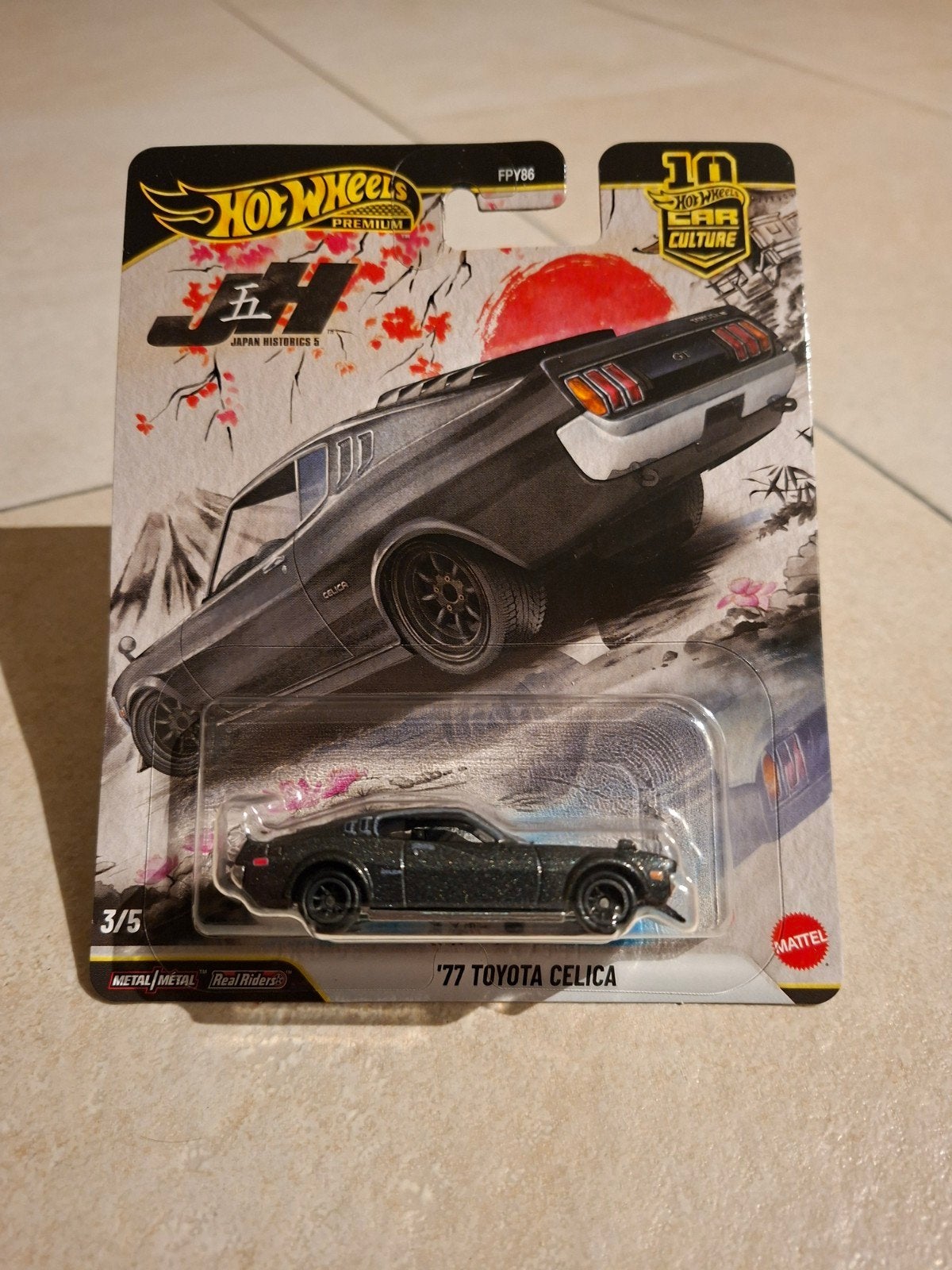 Hot Wheels Premium '77 Toyota Celica Japan Historics 5, Hobby en Vrije tijd, Modelauto's | Overige schalen, Ophalen of Verzenden