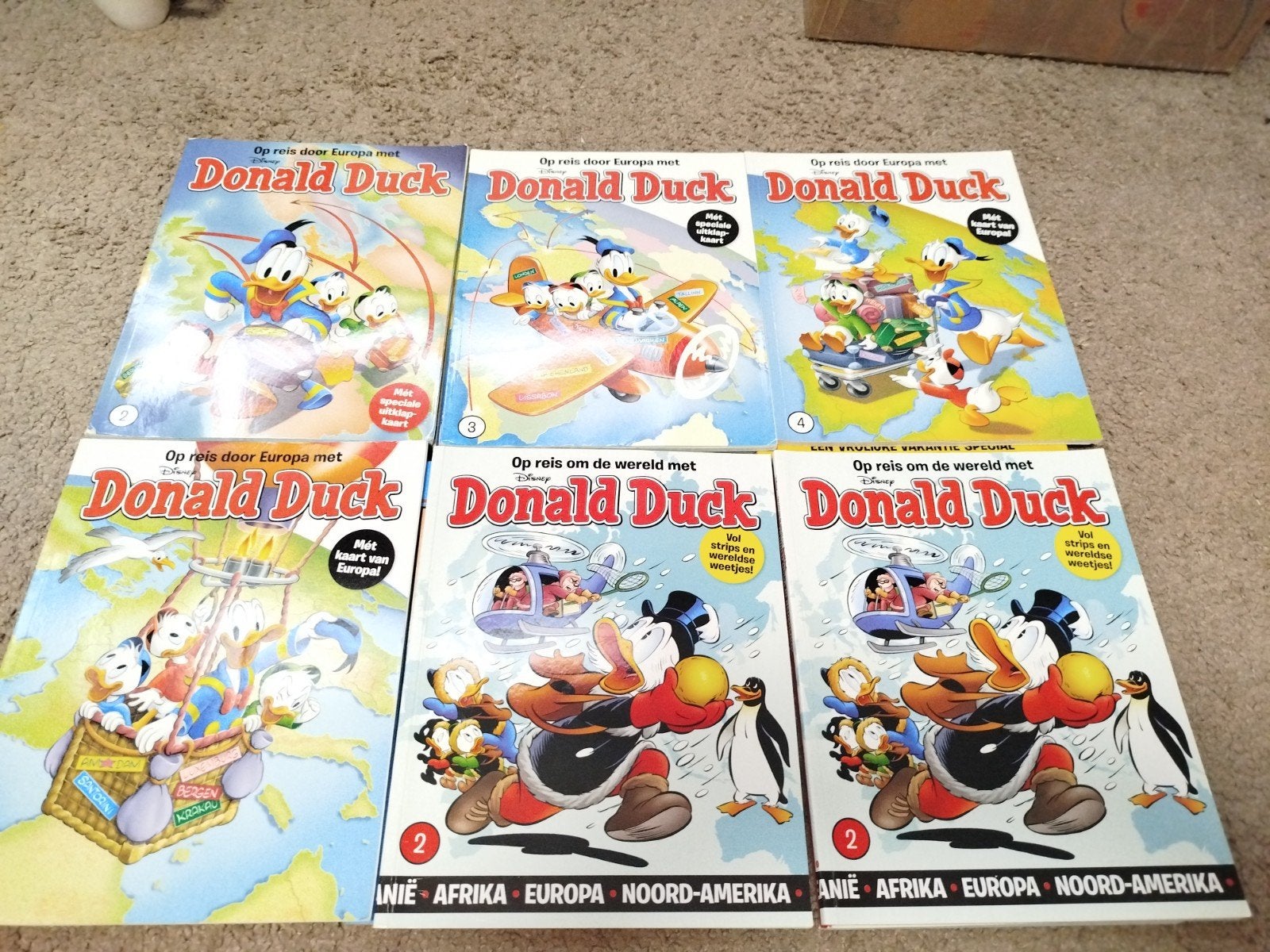 Op reis door Europa met Donald Duck/ op reis om de wereld, Europa, Ophalen of Verzenden, Zo goed als nieuw, Meerdere comics