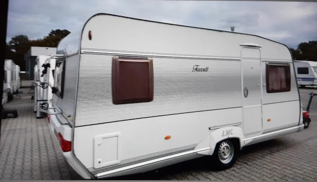 Caravan LMC Munsterland Favorit 490 P1. Bouwjaar 2006., Caravans en Kamperen, Rondzit, Fietsenrek, Frans bed, Particulier
