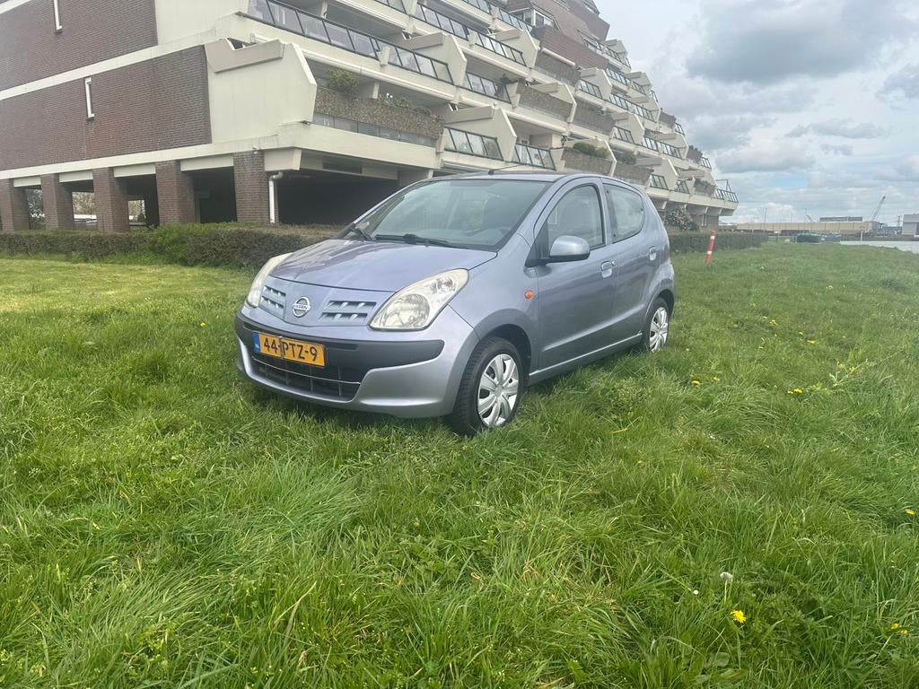 Nissan Pixo 1.0 50KW 5D 2011 Grijs, Auto's, Nissan, Voorwielaandrijving, 200 kg, 4 stoelen, Origineel Nederlands