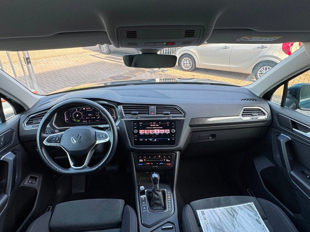 Volkswagen Tiguan 1.4 TSI eHybrid Elegance SOH 91,8% / IQ LI, Auto's, Volkswagen, 1716 kg, Zwart, 4 cilinders, 150 pk